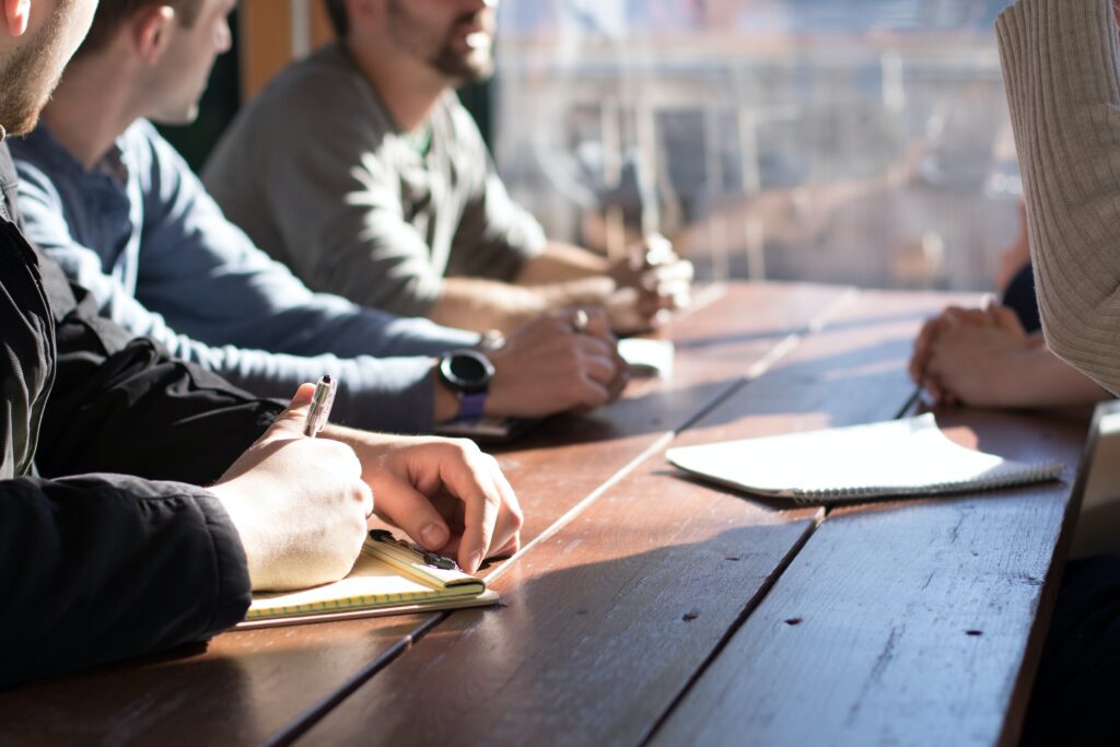 People working at a conference table